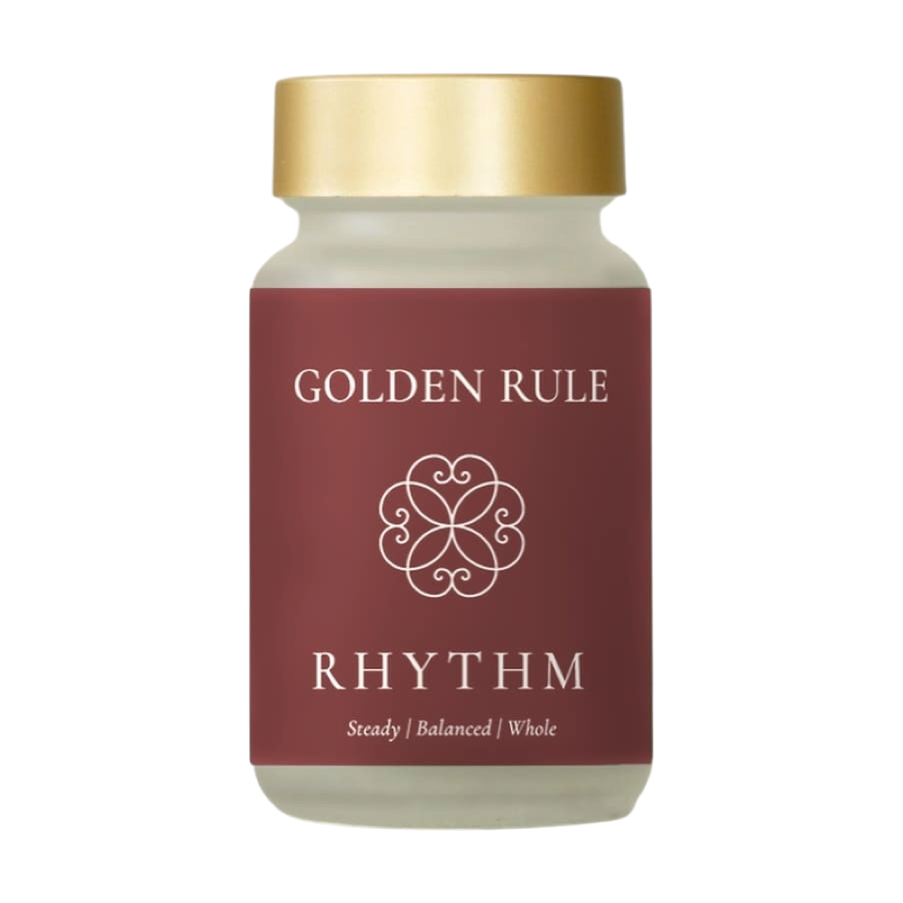 Golden Rule Rhythm capsule bottle with a burgundy label and gold cap